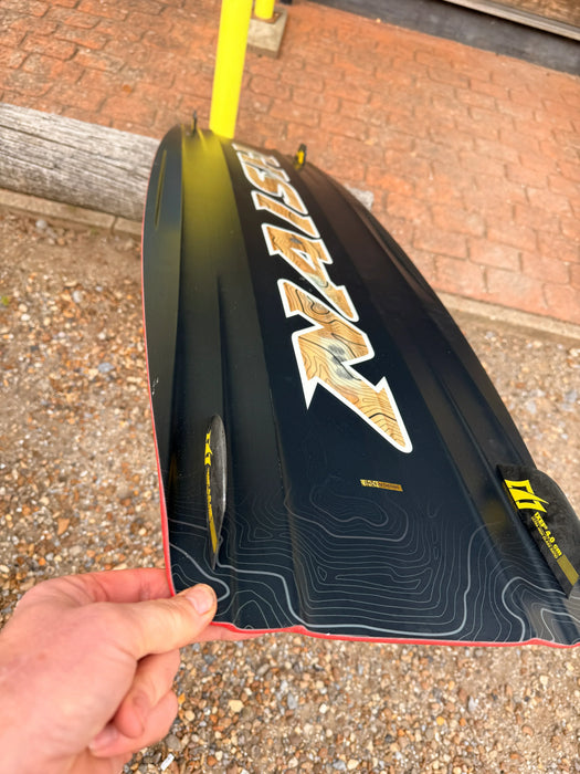 Naish Monarch 135x41cm black kitesurfing board with fins and contour lines pattern