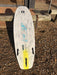 Duotone DLAB Whip D/LAB 5'3 surf kiteboard with white and yellow deck, outdoor setting