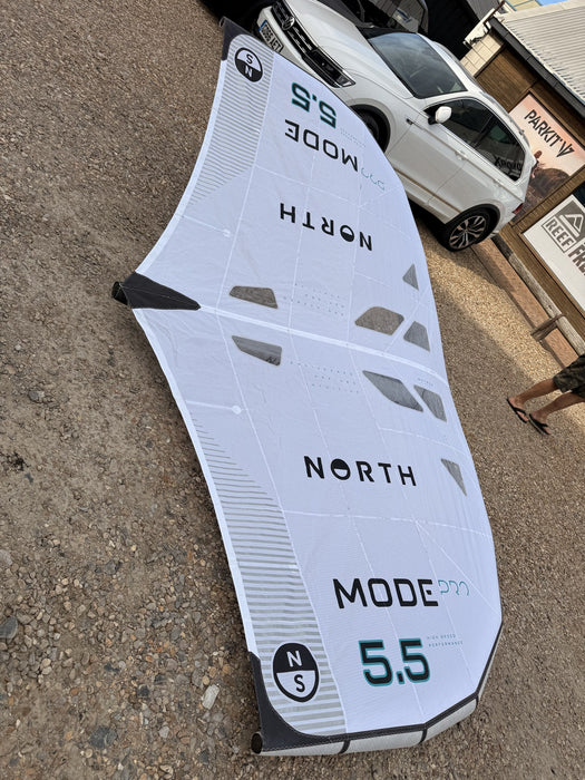 North Mode Pro 5.5m wing standing outside Board-Worx with a car in the background