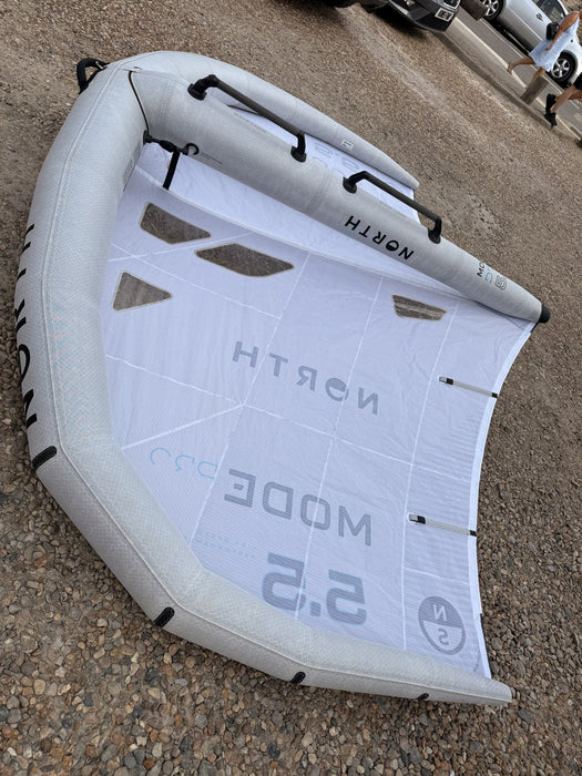 North Mode Pro wing folded showing the leading edge, strut and canopy windows