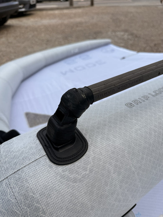 Close-up of the North Mode Pro's Carbon GripLock handle mount and flexible base boot
