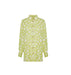 Green floral dress on a website product page with price and size options.