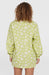 Green long shirt with white daisy print, relaxed fit, viewed from the back