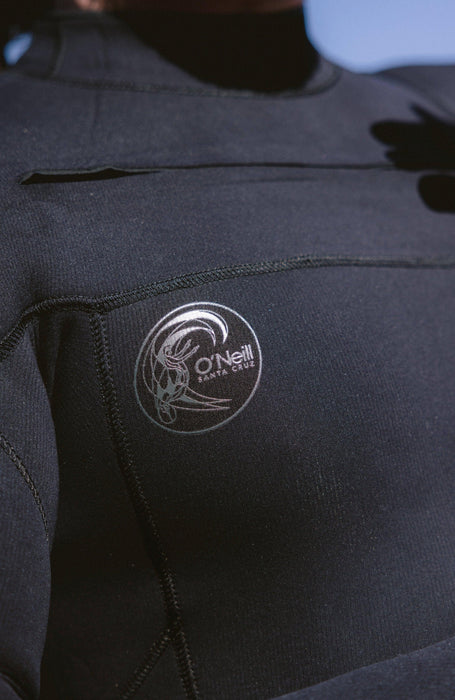 O'Neill black chest zip wetsuit with logo, close-up of winter neoprene material