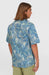 O'Neill blue UPF 50 short sleeve surf shirt with aquatic print, worn by man