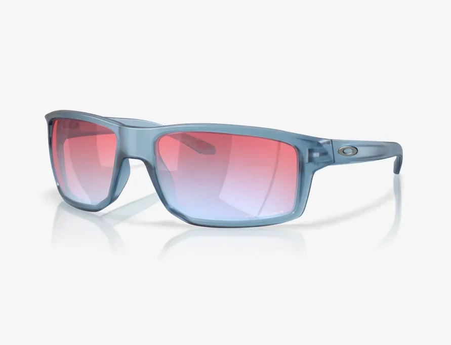 Oakley sunglasses with matte transparent blue frame and pink sapphire Prizm Snow lenses