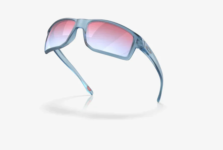 Oakley sports sunglasses with matte transparent blue frame and pink sapphire lenses