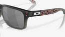 Oakley Holbrook sunglasses with Troy Lee Designs black fade frame, red graphic, Prizm black lenses