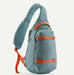 Patagonia Atom sling bag 8L in blue sage with orange straps, single shoulder design