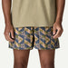 Patagonia surf shorts with palm print, blue and green, ideal for watersports in Whitstable