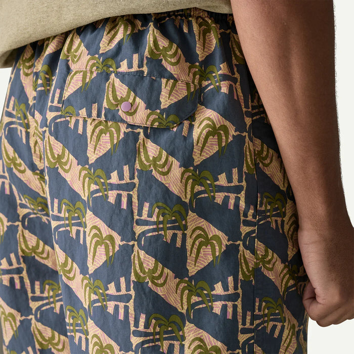 Patterned surf shorts with palm tree design, ideal for watersports in Whitstable, Kent.