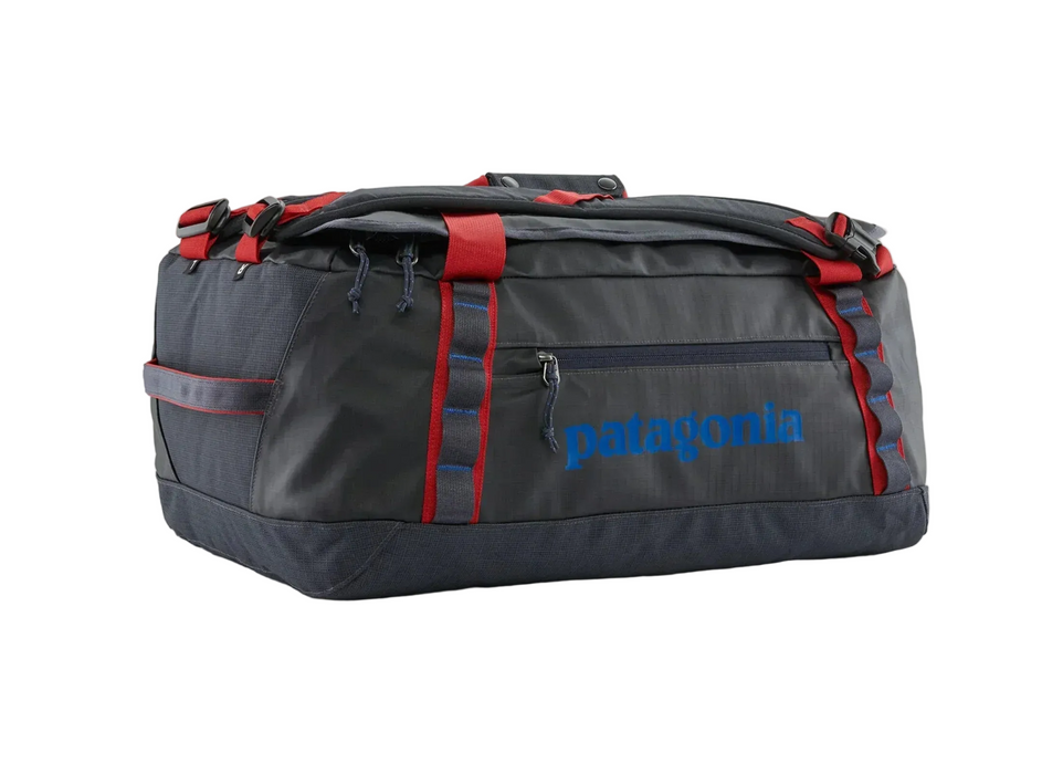 Gray duffel bag with red accents and Patagonia logo on a white background