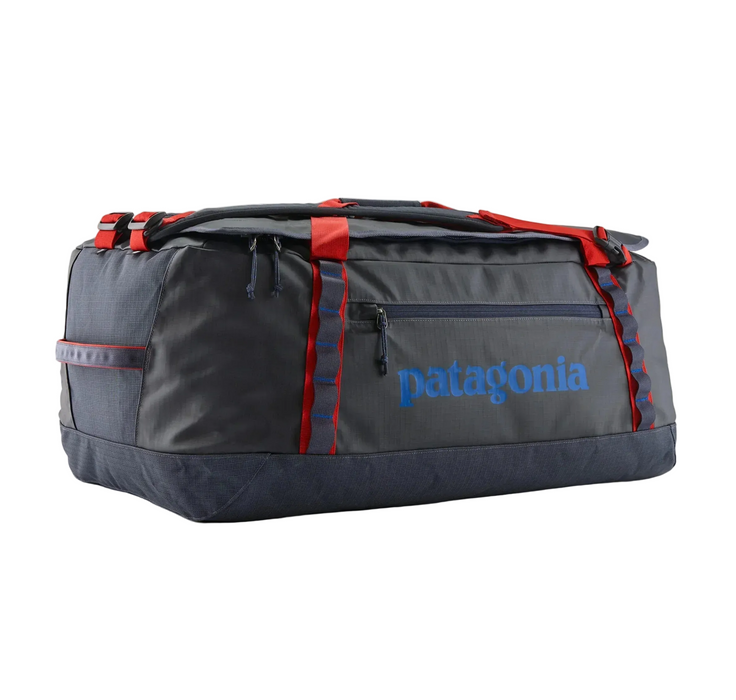 Gray duffel bag with red accents and Patagonia logo on a white background