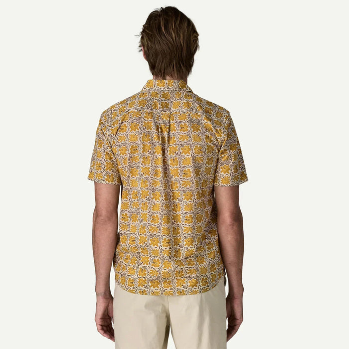 Patagonia floral short sleeve shirt in yellow and white, back view on male model