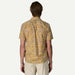 Patagonia floral short sleeve shirt in yellow and white, back view on male model