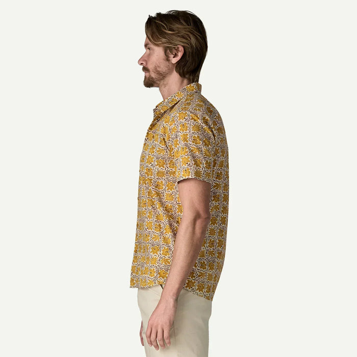 Patagonia men's short sleeve shirt with yellow floral pattern, side view