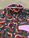 Patagonia fleece pullover with pink buttons and abstract multicolour pattern, watersports clothing