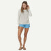 Patagonia women's long-sleeved performance shirt in light grey, ideal for watersports