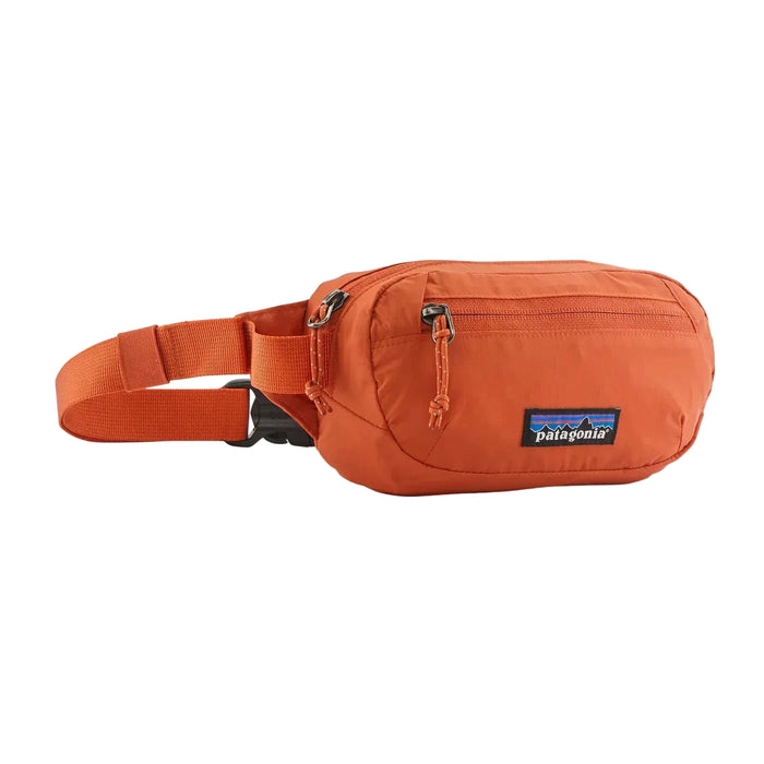 Orange waist bag with Patagonia logo on a white background