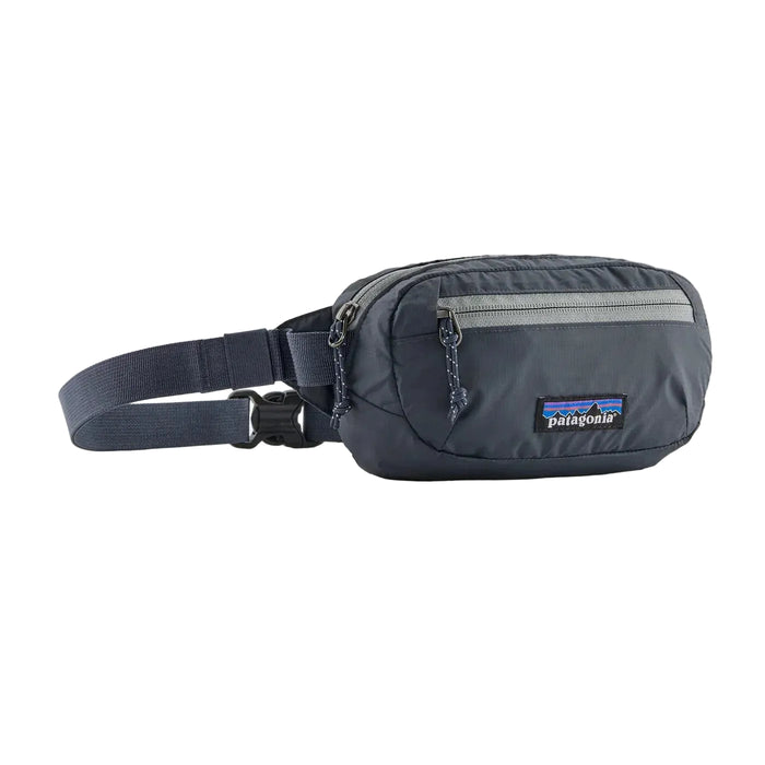 Patagonia Navy blue waist bag with Patagonia logo on a white background
