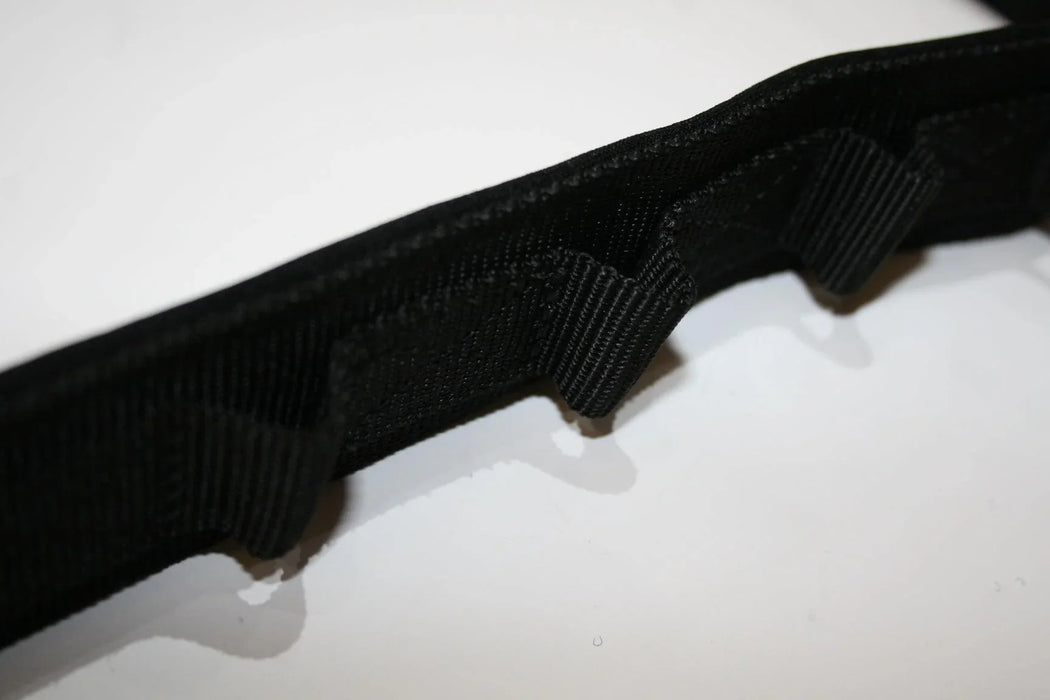 Prolimit wingfoil waist belt in black, close-up of durable strap with loops for watersports