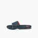 Reef Fanning men's slide sandal in navy, orange, and white, slip-on style for watersports