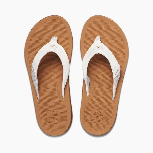 Reef Santa Ana flip flops with white straps and tan soles, surf footwear for watersports