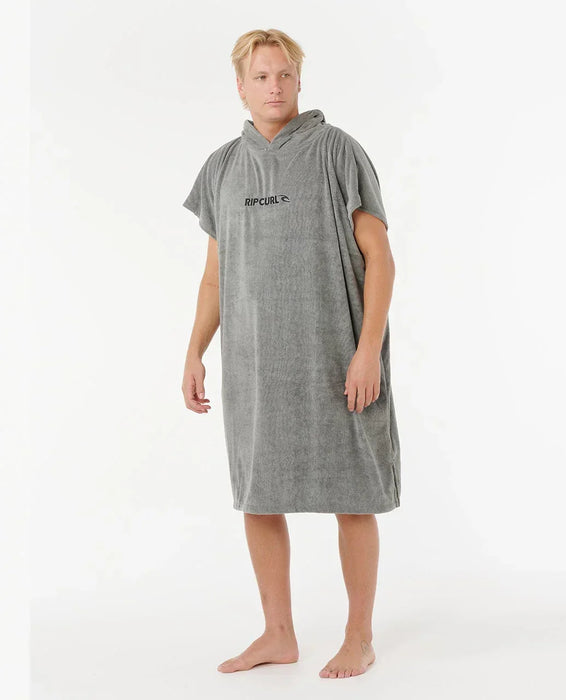 Rip Curl olive hooded towel poncho for watersports, worn by barefoot male model