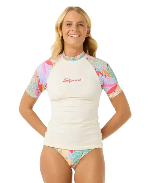 Rip Curl women's short sleeve rash vest with white body and colorful patterned sleeves