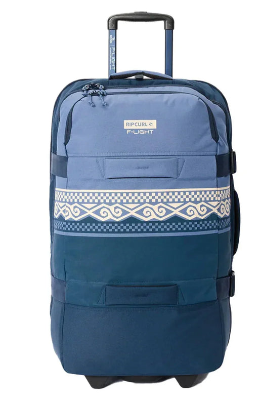 Rip Curl F-Light Global 100L travel bag in blue with patterned stripe and telescopic handle