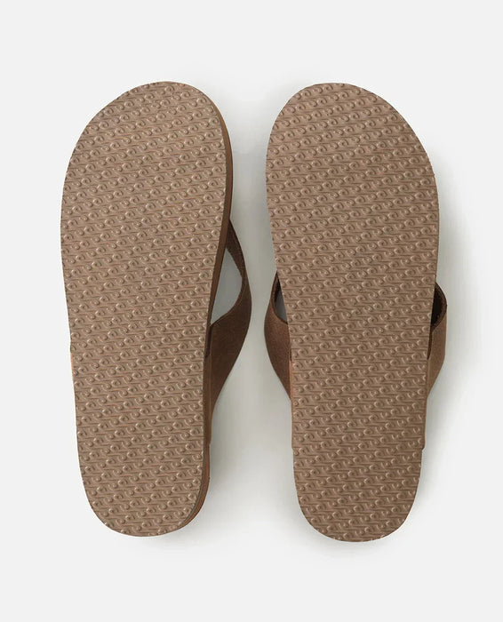 Rip Curl tan leather open toe sandals with textured soles, ideal for surf and beachwear