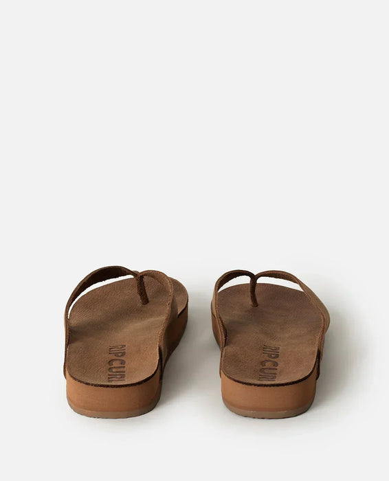 Rip Curl tan leather open toe sandals with embossed logo, viewed from the back