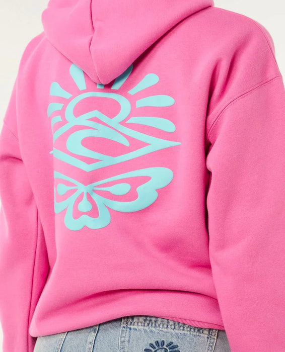 Rip Curl pink surf hoodie with blue heritage graphic on back, worn with denim shorts