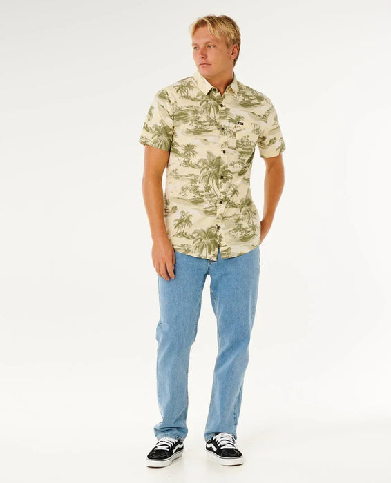 Rip Curl vintage white short sleeve shirt with palm print, worn by man with jeans