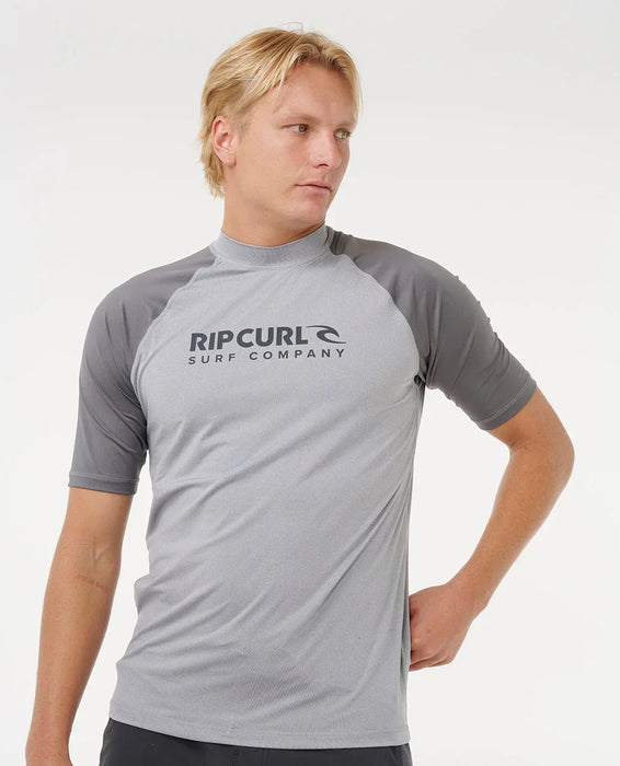 Rip Curl short sleeve grey rash vest with UPF50 worn by male model