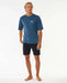 Rip Curl navy marle UPF short sleeve rash vest for men, worn with black board shorts