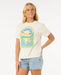 Woman wearing Rip Curl Sun and Sea relaxed fit white surf t-shirt with colorful graphic, paired with denim shorts.