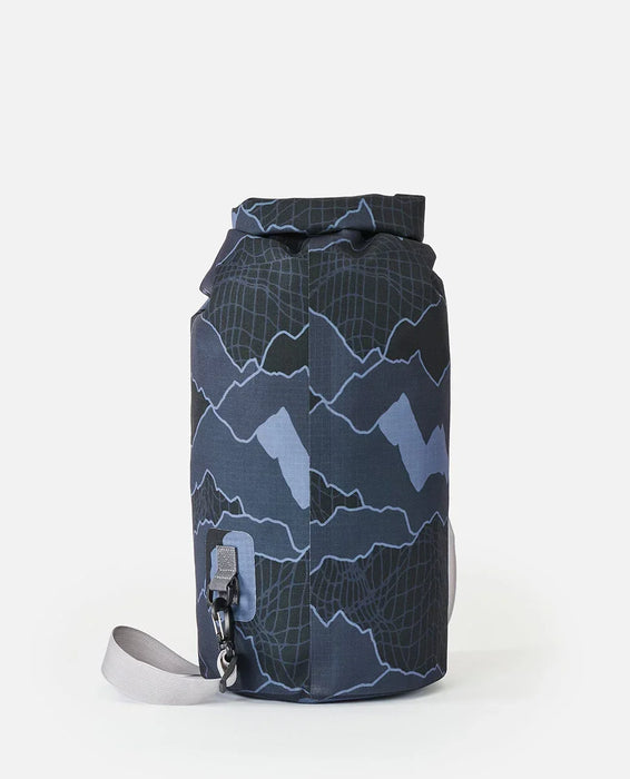 Rip Curl grey dry bag for watersports with abstract wave pattern and adjustable strap