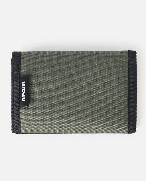 Green wallet with black trim and Rip Curl logo on a white background