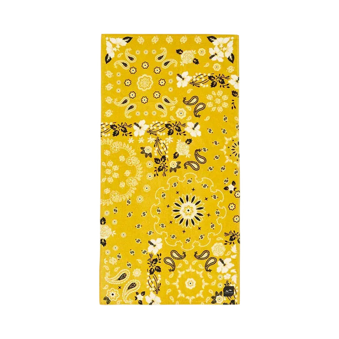 Slowtide Axel beach towel, yellow with floral and paisley pattern, surf accessory