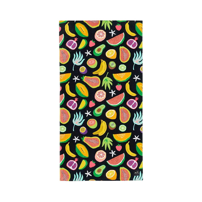 Slowtide beach towel with colorful tropical fruit pattern on black background