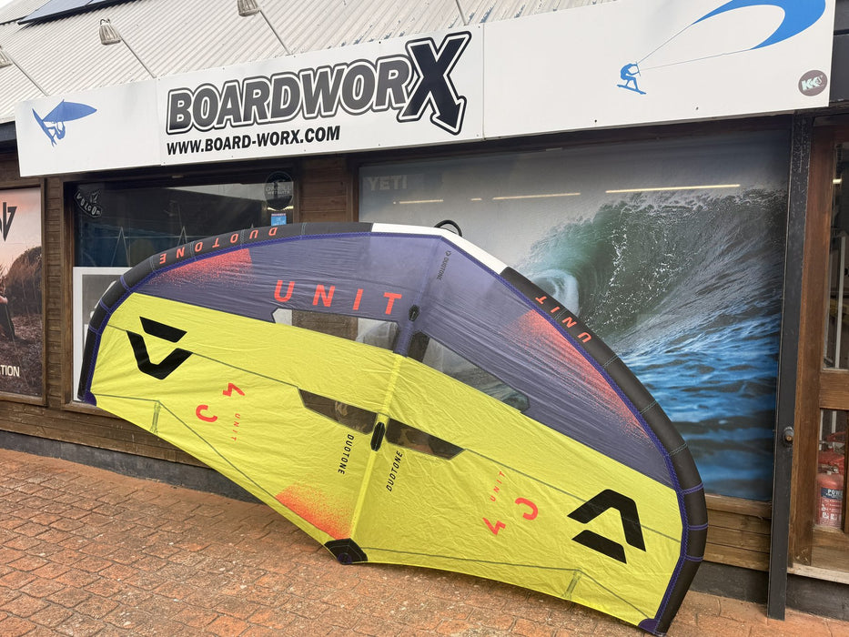 Used 2025 Duotone Unit 4.0m yellow and purple wing outside the Board-Worx shop