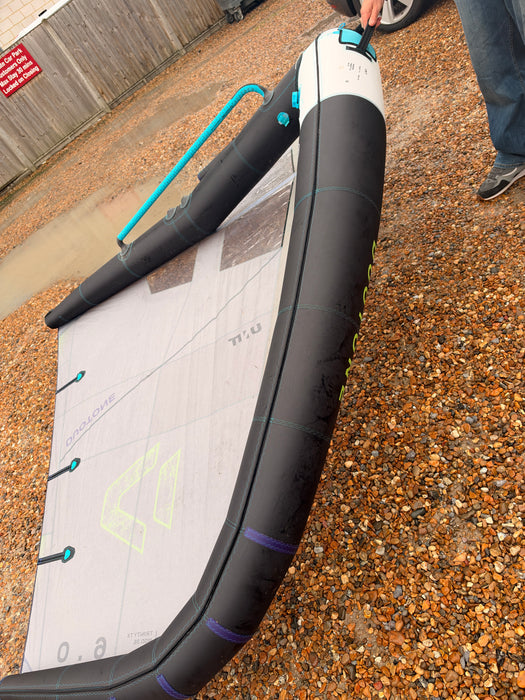Close view of the used Duotone Unit 6m wing and included turquoise boom