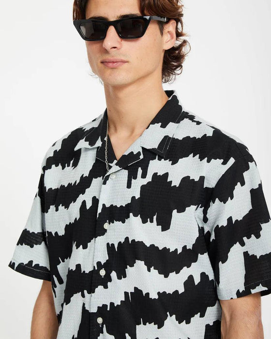 Volcom short sleeve shirt in carolina blue with bold black graphic pattern, surf clothing