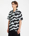 Volcom men's short sleeve shirt with black and light blue abstract pattern, surf clothing
